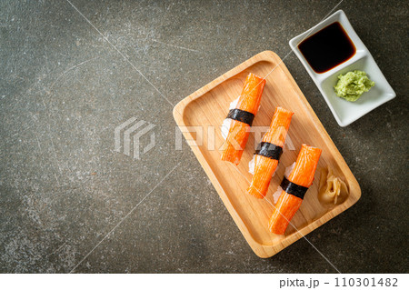 Crab Stick Sushi on wood plate 110301482
