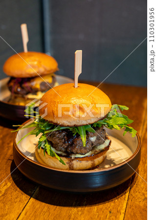 beef burger with cheese on plate 110301956