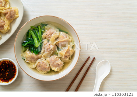 pork wonton soup or pork dumplings soup with vegetable pork wonton soup or pork dumplings soup with vegetable 110303123