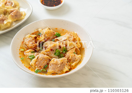 pork wonton soup or pork dumplings soup with roasted chili pork wonton soup or pork dumplings soup with roasted chili 110303126
