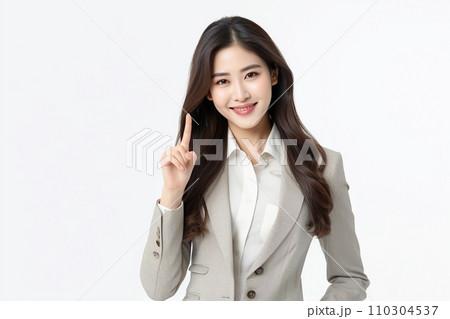 指をさす笑顔の女性（上・NO1・スーツ） 110304537