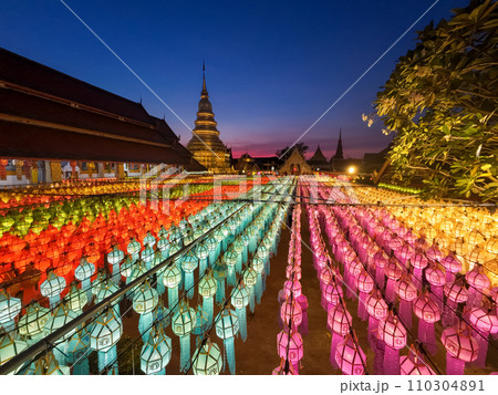 Paper lanterns in the Yee Peng Festival decorate around Lumphun downtown, Thailand. 110304891