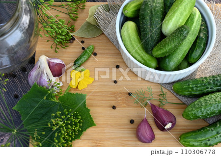 a set of ingredients for pickling cucumbers, pickled cucumbers, brine. a set of ingredients for pickling cucumbers, pickled cucumbers, brine. 110306778