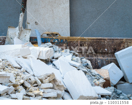 Spade in pile of rubble. Spade in pile of rubble. 110311558