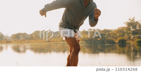 Athlete runner feet running on road, Jogging concept at outdoors. Man running for exercise..Athlete runner feet running on road, Jogging concept at outdoors. Man running for exercise. Athlete runner feet running on road, Jogging concept at outdoors. Man running for exercise..Athlete runner feet running on road, Jogging concept at outdoors. Man running for exercise. 110314208