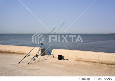 a fishing rod is installed in the sea. 110315595