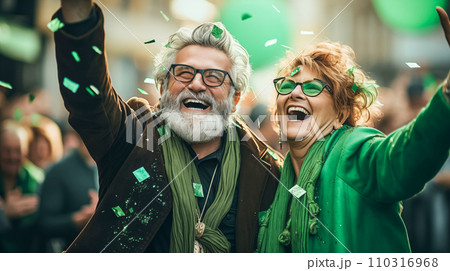 AI-generated content. Modern adult man with a beard and a woman joyfully celebrating St. Patrick's Day participate in the city parade 110316968