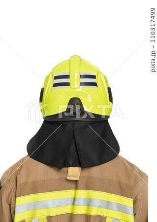 Unrecognizable firefighter in yellow protective helmet and uniform in studio. Back view of anonymous male fireman in full gear, with copy space, isolated on white background. Fire equipment concept. 110317499