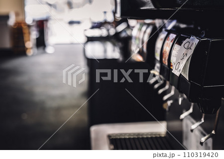 Out of Order sign posted on a soda pop fountain dispenser  110319420