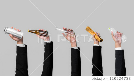 Businessman's hand holding garbage waste on isolated background. Quaint 110324758