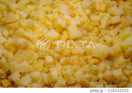 Boiled potatoes cut into small cubes. Making salads in large quantities Boiled potatoes cut into small cubes. Making salads in large quantities 110332333
