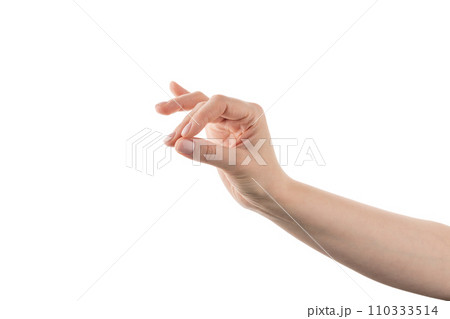 Young woman hand holding something with fingers isolated on white background 110333514