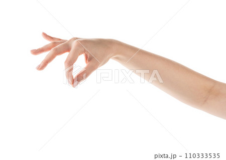 Young woman hand holding something with fingers from the top isolated on white background Young woman hand holding something with fingers from the top isolated on white background 110333535