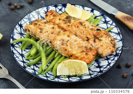 Grilled baked roasted cooked fish salmon. 110334576