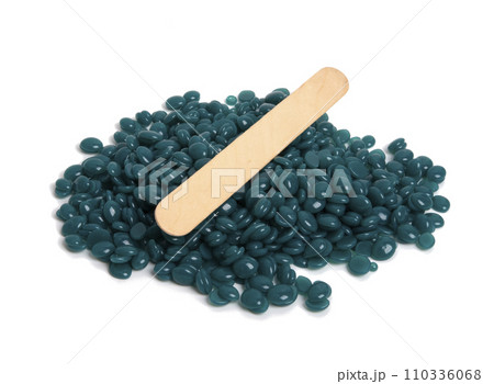 spa wax for depilation in granular form on the white background spa wax for depilation in granular form on the white background 110336068