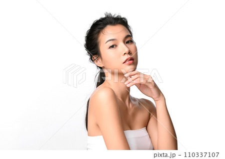 Beautiful young asian woman with clean fresh skin on white background, Face care, Facial treatment, Cosmetology, beauty and spa, Asian women portrait. 110337107