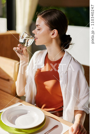 Woman person water female drinking lady lifestyle glass young attractive fresh beauty 110340247