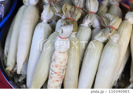 Organic sweet peeled corn in the Steamer for sale in the north of Thailand street food Market some boiled corn. healthy food and diet theme. flat lay. boiled corn (jagung rebus) Organic sweet peeled corn in the Steamer for sale in the north of Thailand street food Market some boiled corn. healthy food and diet theme. flat lay. boiled corn (jagung rebus) 110340965