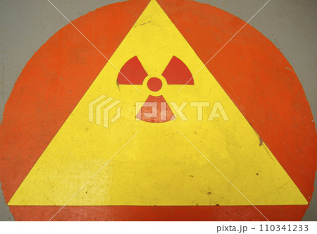 Old radiation hazard sign, set in the Chornobyl Nuclear plant Old radiation hazard sign, set in the Chornobyl Nuclear plant 110341233