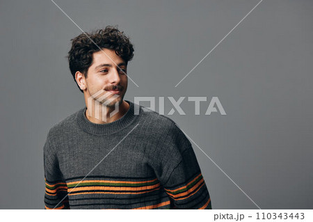 Positive man hispanic fashion person portrait trendy hipster sweater handsome face style smile copyspace 110343443