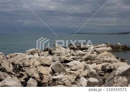 Stones on the coast of the Ionian sea, Roda, Corfu Stones on the coast of the Ionian sea, Roda, Corfu 110343571