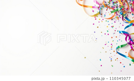 colorful confetti and streamers on white background with copy space 110345077