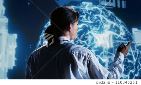 Overseeing manager developing artificial intelligence neural networks architecture inspired by human brain. Meticulous inspector setting up AI machine learning algorithms in high tech startup Overseeing manager developing artificial intelligence neural networks architecture inspired by human brain. Meticulous inspector setting up AI machine learning algorithms in high tech startup 110345251
