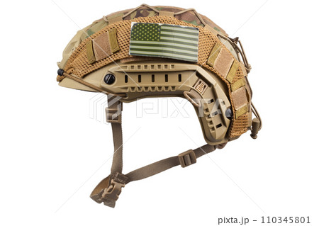 Camouflaged military helmet with US flag patch 110345801