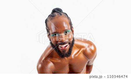 Smiling african-american bearded gay man close up Smiling african-american bearded gay man close up 110346474