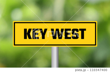 Key west road sign on blur background 110347400