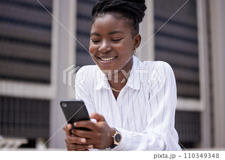 Phone, communication or networking with a business woman working in the city with motivation, a vision and a mission for growth and development. 5g mobile technology with a marketing worker outside 110349348