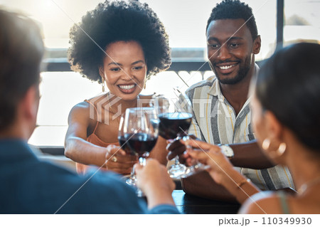 Cheers, celebrating and winning friends drinking wine together at a dinner celebration in a restaurant. Double date of loving and romantic couples dining and having fun on a weekend 110349930