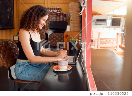 Coffee shop owner, cafe manager or startup company woman on her laptop working, planning and organizing project ideas for website. Happy, smiling and excited business freelancer doing SEO research 110350523