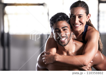 Fitness couple, gym friends and team hugging, holding and celebrating successful workout, training and exercise together. Portrait of smiling, happy and healthy man and woman after wellness teamwork Fitness couple, gym friends and team hugging, holding and celebrating successful workout, training and exercise together. Portrait of smiling, happy and healthy man and woman after wellness teamwork 110350802