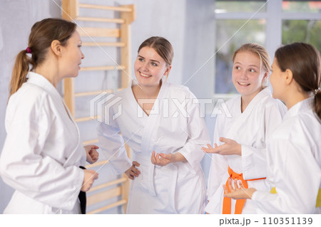 Group of girls in kimono chatting Group of girls in kimono chatting 110351139