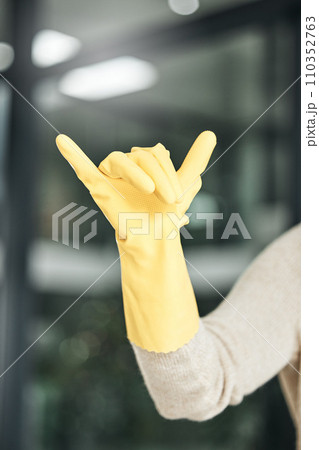 Call me, hang loose sign and call us hand gesture for cleaning, chores and housework domestic for hire at home. Closeup of calling gestures of a cleaner ready for employment for all house needs. Call me, hang loose sign and call us hand gesture for cleaning, chores and housework domestic for hire at home. Closeup of calling gestures of a cleaner ready for employment for all house needs. 110352763