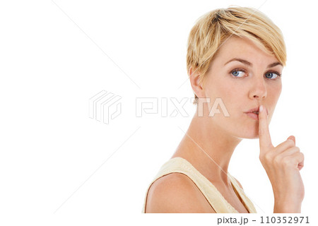 Woman, secret and finger on lips for gossip or confidential information on a white studio background. Face of female person, model or blonde in silence for quiet, whisper or shush on mockup space Woman, secret and finger on lips for gossip or confidential information on a white studio background. Face of female person, model or blonde in silence for quiet, whisper or shush on mockup space 110352971