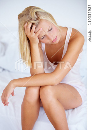 Woman, stress and headache in home bedroom for depression, anxiety and burnout worry. Morning, frustrated and tired person in house for mental health, migraine and pain from crisis, mistake and fail 110352988