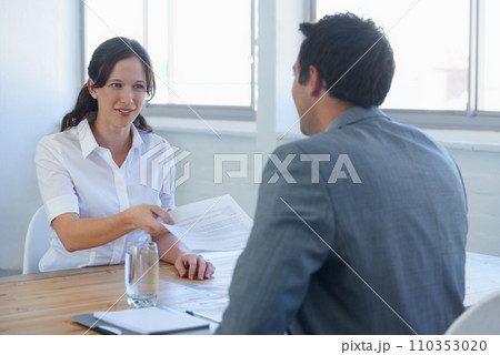Business woman, job interview and documents, CV or resume for human resources, recruitment or hiring process. Professional employer, manager or clients giving paperwork for career review in a meeting Business woman, job interview and documents, CV or resume for human resources, recruitment or hiring process. Professional employer, manager or clients giving paperwork for career review in a meeting 110353020