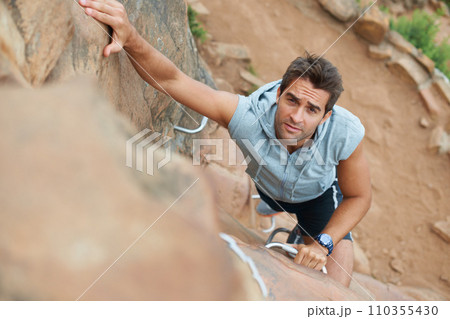 Fitness, challenge and rock with man and climbing in nature for adventure, health or performance. Training, environment and explore with person on cliff of mountain terrain for backpacking and travel Fitness, challenge and rock with man and climbing in nature for adventure, health or performance. Training, environment and explore with person on cliff of mountain terrain for backpacking and travel 110355430