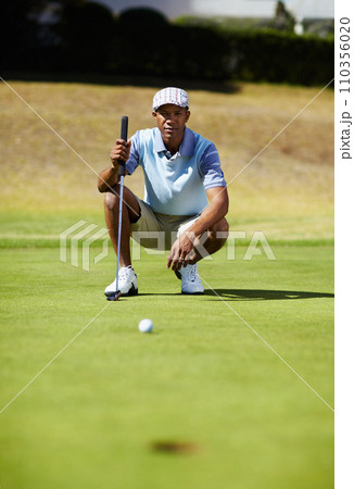 Sports, golf hole and black man on course for playing game, practice and training for competition. Recreation, golfer and person on grass for tee, ball and golfing club for winning stroke or score Sports, golf hole and black man on course for playing game, practice and training for competition. Recreation, golfer and person on grass for tee, ball and golfing club for winning stroke or score 110356020