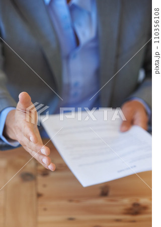 Business person, handshake offer and document for job interview, corporate meeting and hiring or recruitment. Professional manager, employer shaking hands or POV introduction with resume, CV or paper Business person, handshake offer and document for job interview, corporate meeting and hiring or recruitment. Professional manager, employer shaking hands or POV introduction with resume, CV or paper 110356108