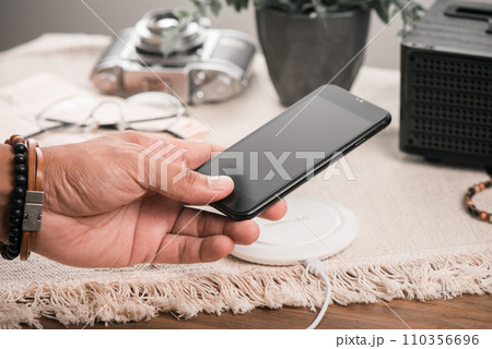 charging the smartphone 110356696