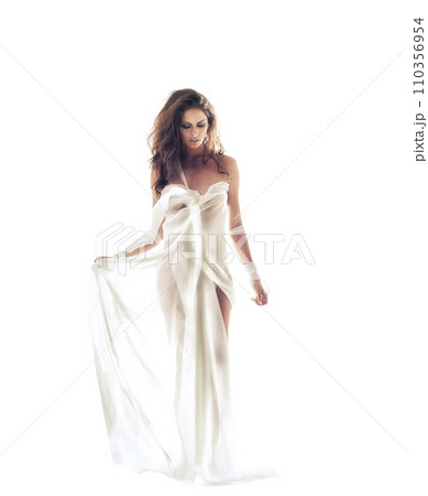 Woman, elegant and fashion with hair for white background in studio in Italy. Female model, confident or looking down for pose in ethereal, vintage or chic clothes with cool, trendy or edgy hairstyle Woman, elegant and fashion with hair for white background in studio in Italy. Female model, confident or looking down for pose in ethereal, vintage or chic clothes with cool, trendy or edgy hairstyle 110356954