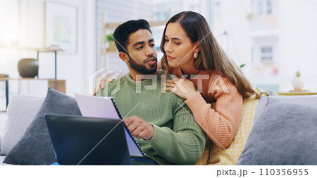 Laptop, finance and couple on sofa for planning, online banking and budget payment at home. Living room, marriage and man and woman with paperwork, bills and computer for insurance, savings and taxes Laptop, finance and couple on sofa for planning, online banking and budget payment at home. Living room, marriage and man and woman with paperwork, bills and computer for insurance, savings and taxes 110356955