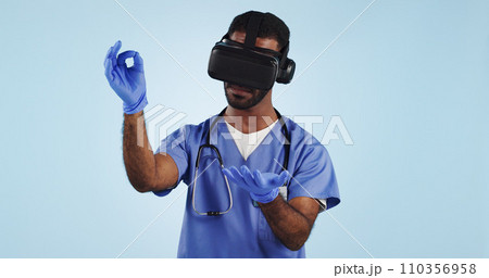 Nurse, man and virtual reality glasses for surgery, healthcare innovation and surgeon on a blue studio background. Doctor, medical and professional with VR eyewear, future and tech with digital app Nurse, man and virtual reality glasses for surgery, healthcare innovation and surgeon on a blue studio background. Doctor, medical and professional with VR eyewear, future and tech with digital app 110356958