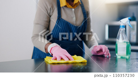 Woman, hands and cleaning table in kitchen for housekeeping, hygiene or sanitary surface at home. Closeup of female person, maid or cleaner wiping furniture for disinfection, germ or bacteria removal Woman, hands and cleaning table in kitchen for housekeeping, hygiene or sanitary surface at home. Closeup of female person, maid or cleaner wiping furniture for disinfection, germ or bacteria removal 110357230