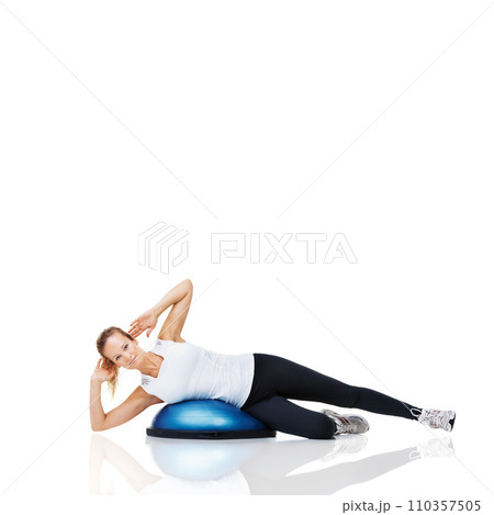 Woman, portrait and lying on bosu ball for exercise, workout or training on a white studio background. Active female person on half round object for pilates, practice or strong core on mockup space Woman, portrait and lying on bosu ball for exercise, workout or training on a white studio background. Active female person on half round object for pilates, practice or strong core on mockup space 110357505