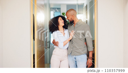 Home, hug and couple with doorway, funny and marriage with relationship, bonding and romance. Apartment, people and man with woman, embrace or happiness with humor, smile and laughing with date 110357999