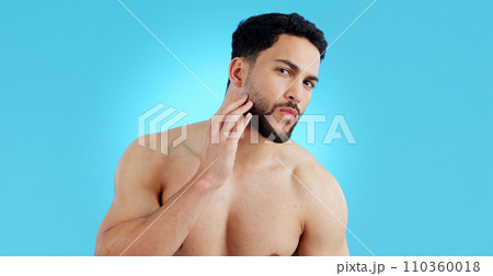 Man, portrait and beard in grooming, skincare or hygiene isolated against a blue studio background. Face of handsome or attractive male person or model in beauty, facial cleaning or routine on mockup 110360018